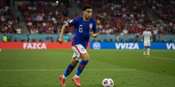 Modern Fullbacks: American Defenders' Offensive Impact in 2024 American fullback making an offensive run on a soccer field