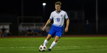 American soccer player demonstrating intense focus during a match.