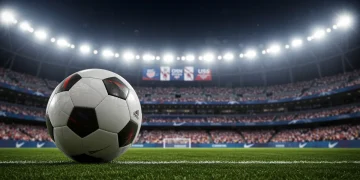 Soccer ball in mid-air during a night game, stadium lights, and cheering crowd in the background, symbolizing US Open Cup excitement.