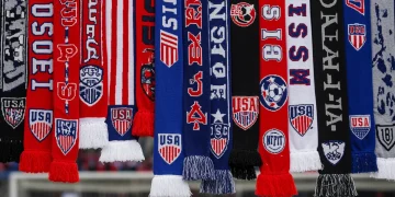 Colorful collection of US soccer fan scarves for display