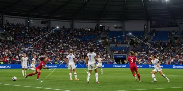 USWNT players in a new tactical formation on the field, symbolizing strategic changes for 2025 international competitions.