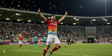 Player celebrating a dramatic game-winning goal in a US soccer match